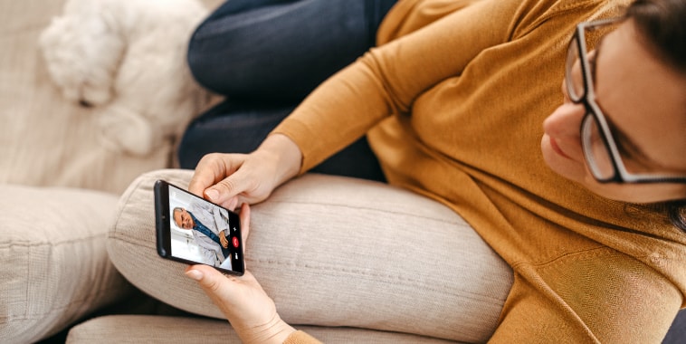 Person using Teladoc on a smart phone