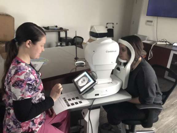 Patient using an eyePACS device.