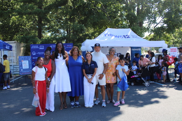 Group picture at a backpack giveaway event