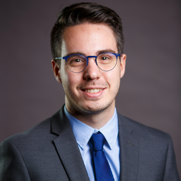 headshot of Chris grey background